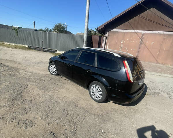 Черный Форд Фокус, объемом двигателя 1.6 л и пробегом 244 тыс. км за 5700 $, фото 4 на Automoto.ua