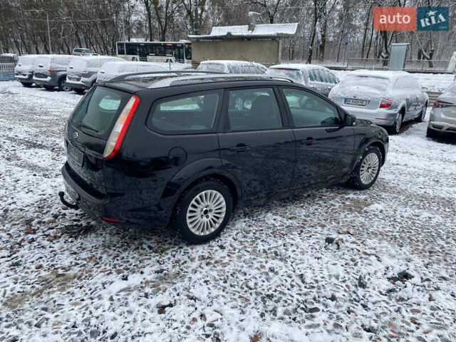 Черный Форд Фокус, объемом двигателя 1.8 л и пробегом 157 тыс. км за 5720 $, фото 13 на Automoto.ua