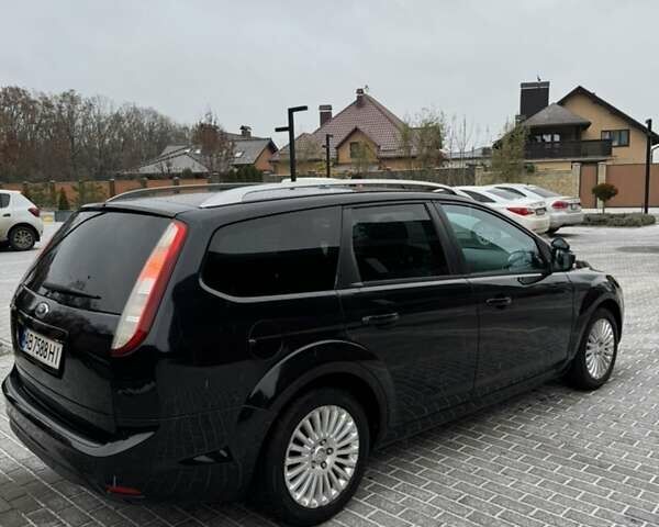 Черный Форд Фокус, объемом двигателя 2 л и пробегом 249 тыс. км за 5900 $, фото 3 на Automoto.ua