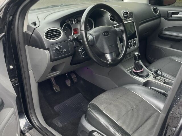 Черный Форд Фокус, объемом двигателя 1.6 л и пробегом 307 тыс. км за 5300 $, фото 12 на Automoto.ua