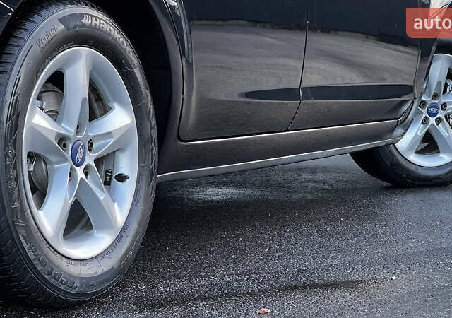 Черный Форд Фокус, объемом двигателя 1.8 л и пробегом 218 тыс. км за 5799 $, фото 14 на Automoto.ua