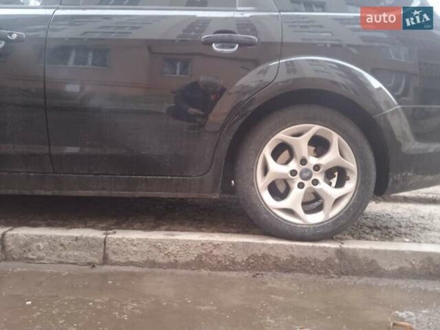 Черный Форд Фокус, объемом двигателя 1.6 л и пробегом 250 тыс. км за 5850 $, фото 3 на Automoto.ua