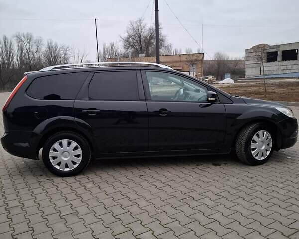 Черный Форд Фокус, объемом двигателя 1.6 л и пробегом 270 тыс. км за 6800 $, фото 7 на Automoto.ua