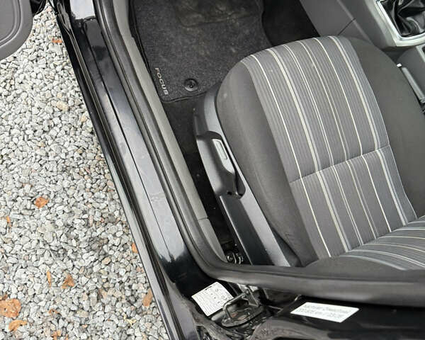 Черный Форд Фокус, объемом двигателя 1.6 л и пробегом 195 тыс. км за 5700 $, фото 118 на Automoto.ua