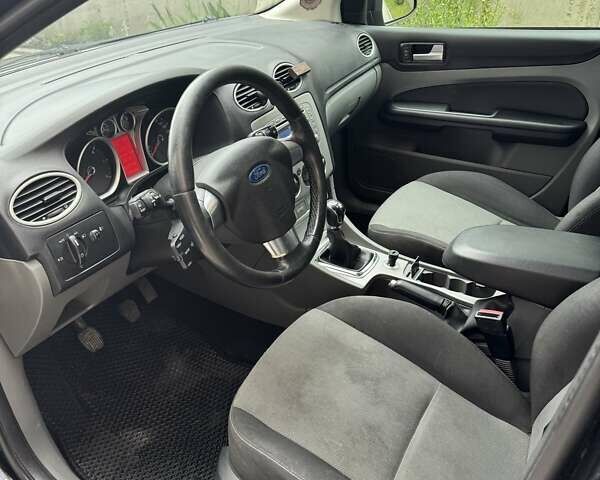 Черный Форд Фокус, объемом двигателя 1.56 л и пробегом 290 тыс. км за 5400 $, фото 13 на Automoto.ua