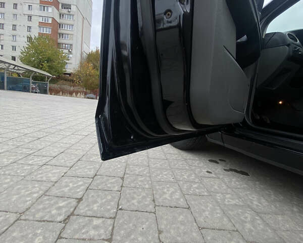 Черный Форд Фокус, объемом двигателя 1.56 л и пробегом 276 тыс. км за 6150 $, фото 12 на Automoto.ua