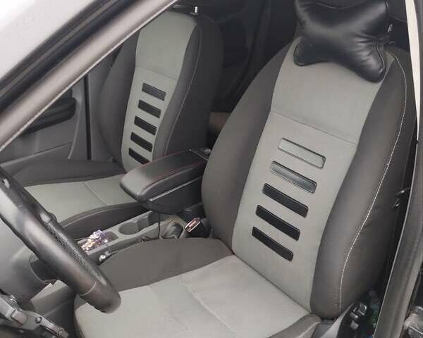 Черный Форд Фокус, объемом двигателя 1.6 л и пробегом 282 тыс. км за 5300 $, фото 11 на Automoto.ua