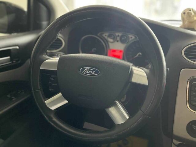 Черный Форд Фокус, объемом двигателя 1.8 л и пробегом 239 тыс. км за 6300 $, фото 14 на Automoto.ua