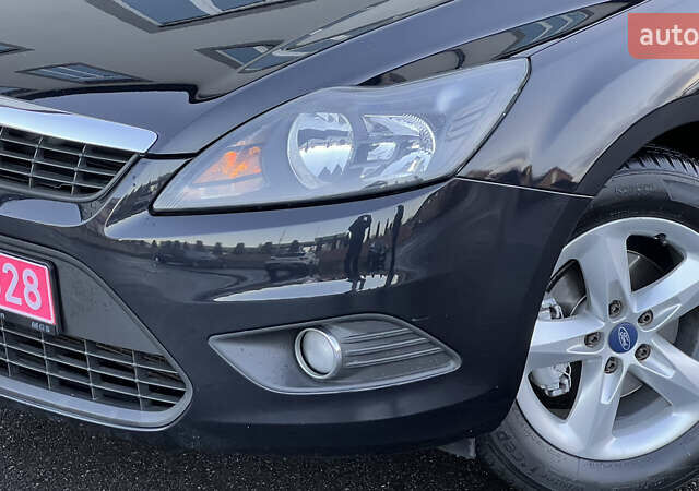 Черный Форд Фокус, объемом двигателя 1.8 л и пробегом 218 тыс. км за 5799 $, фото 22 на Automoto.ua