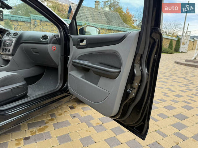 Черный Форд Фокус, объемом двигателя 1.6 л и пробегом 216 тыс. км за 5650 $, фото 18 на Automoto.ua