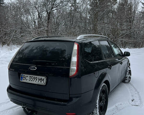 Черный Форд Фокус, объемом двигателя 1.8 л и пробегом 265 тыс. км за 5700 $, фото 6 на Automoto.ua