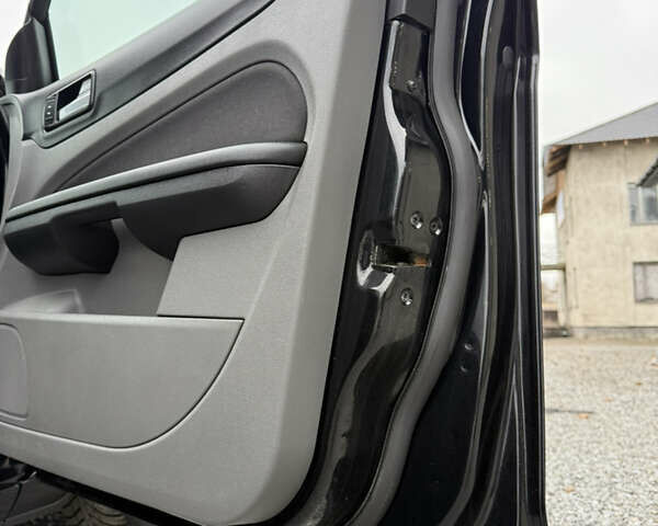 Черный Форд Фокус, объемом двигателя 1.6 л и пробегом 195 тыс. км за 5700 $, фото 130 на Automoto.ua