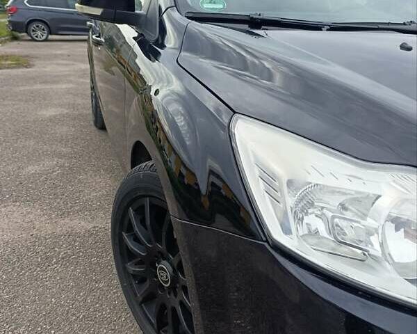 Черный Форд Фокус, объемом двигателя 1.8 л и пробегом 170 тыс. км за 6400 $, фото 2 на Automoto.ua