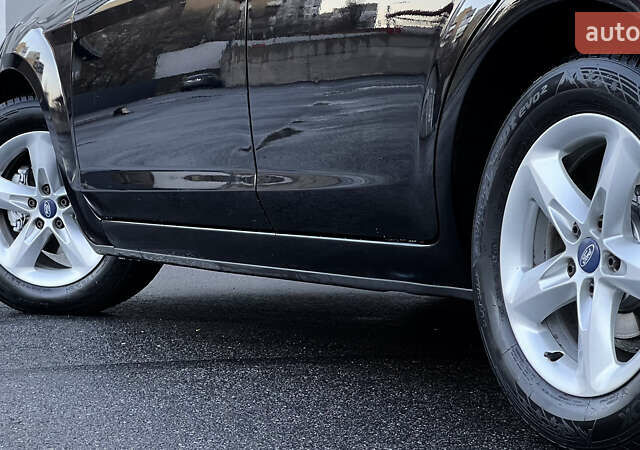 Черный Форд Фокус, объемом двигателя 1.8 л и пробегом 218 тыс. км за 5799 $, фото 12 на Automoto.ua