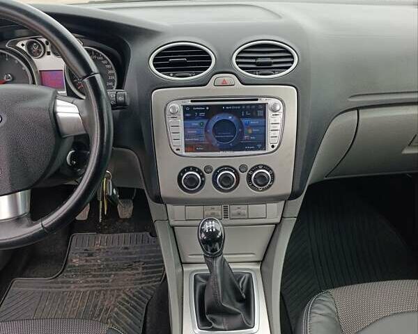Черный Форд Фокус, объемом двигателя 1.8 л и пробегом 170 тыс. км за 6400 $, фото 24 на Automoto.ua