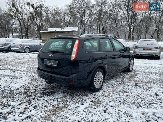 Черный Форд Фокус, объемом двигателя 1.8 л и пробегом 157 тыс. км за 5720 $, фото 11 на Automoto.ua