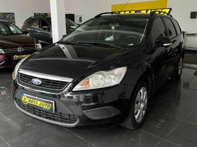 Черный Форд Фокус, объемом двигателя 1.8 л и пробегом 239 тыс. км за 6300 $, фото 2 на Automoto.ua