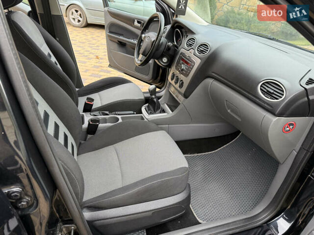 Черный Форд Фокус, объемом двигателя 1.6 л и пробегом 216 тыс. км за 5650 $, фото 20 на Automoto.ua