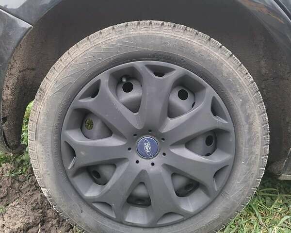 Черный Форд Фокус, объемом двигателя 1.56 л и пробегом 245 тыс. км за 5400 $, фото 4 на Automoto.ua