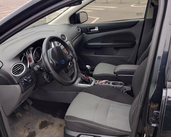 Черный Форд Фокус, объемом двигателя 1.6 л и пробегом 282 тыс. км за 5300 $, фото 12 на Automoto.ua