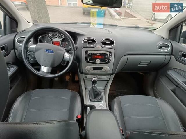 Черный Форд Фокус, объемом двигателя 1.8 л и пробегом 286 тыс. км за 5850 $, фото 12 на Automoto.ua