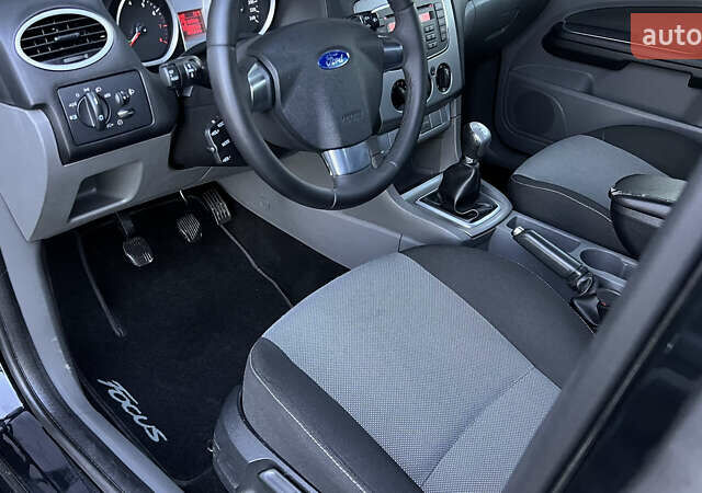 Черный Форд Фокус, объемом двигателя 1.8 л и пробегом 218 тыс. км за 5799 $, фото 41 на Automoto.ua