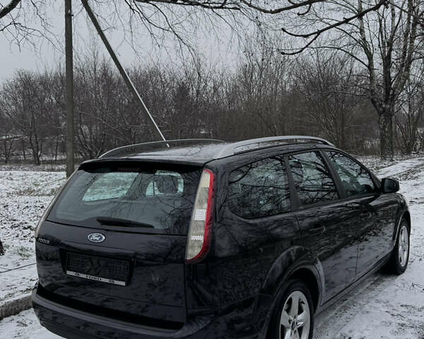 Черный Форд Фокус, объемом двигателя 1.6 л и пробегом 235 тыс. км за 6200 $, фото 6 на Automoto.ua