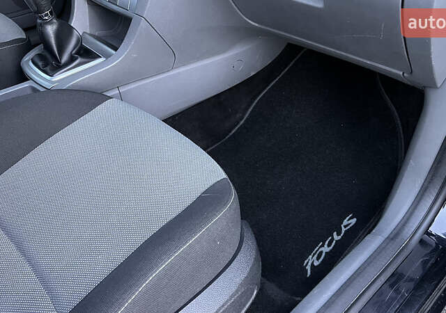 Черный Форд Фокус, объемом двигателя 1.8 л и пробегом 218 тыс. км за 5799 $, фото 40 на Automoto.ua