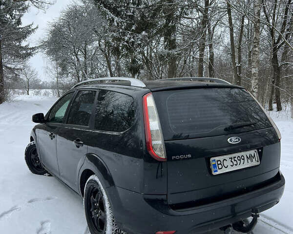 Черный Форд Фокус, объемом двигателя 1.8 л и пробегом 265 тыс. км за 5700 $, фото 5 на Automoto.ua