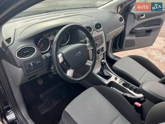 Черный Форд Фокус, объемом двигателя 1.6 л и пробегом 191 тыс. км за 5999 $, фото 13 на Automoto.ua