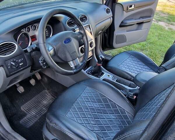 Чорний Форд Фокус, об'ємом двигуна 1.56 л та пробігом 320 тис. км за 4850 $, фото 5 на Automoto.ua