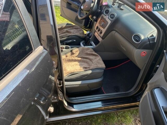 Черный Форд Фокус, объемом двигателя 1.6 л и пробегом 280 тыс. км за 5750 $, фото 6 на Automoto.ua