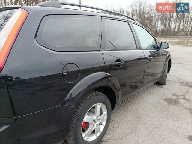 Черный Форд Фокус, объемом двигателя 1.56 л и пробегом 236 тыс. км за 5900 $, фото 7 на Automoto.ua