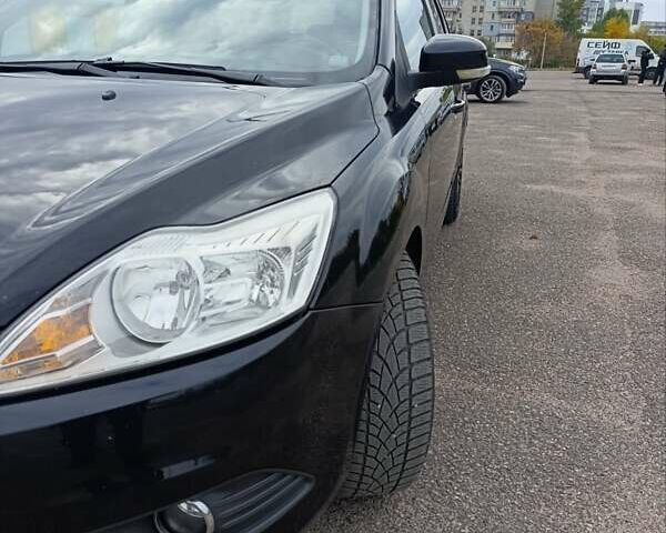 Черный Форд Фокус, объемом двигателя 1.8 л и пробегом 170 тыс. км за 6400 $, фото 1 на Automoto.ua