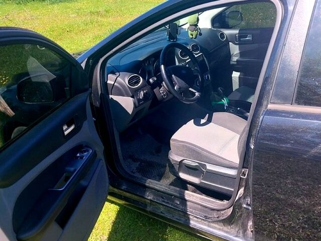 Черный Форд Фокус, объемом двигателя 1.6 л и пробегом 22100 тыс. км за 6000 $, фото 5 на Automoto.ua