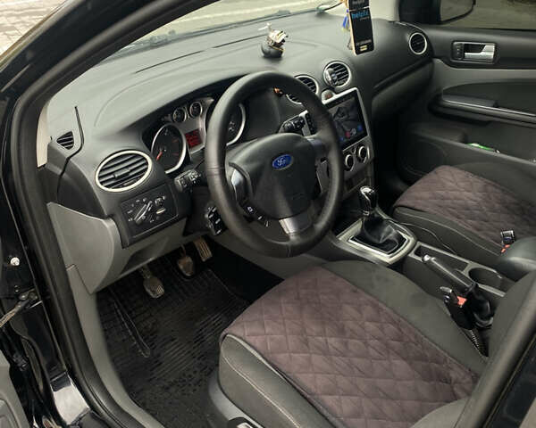 Черный Форд Фокус, объемом двигателя 1.56 л и пробегом 276 тыс. км за 6150 $, фото 6 на Automoto.ua