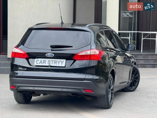Чорний Форд Фокус, об'ємом двигуна 1.6 л та пробігом 225 тис. км за 6999 $, фото 16 на Automoto.ua