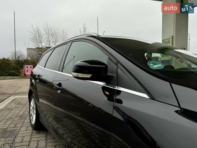 Черный Форд Фокус, объемом двигателя 1.6 л и пробегом 243 тыс. км за 8350 $, фото 11 на Automoto.ua