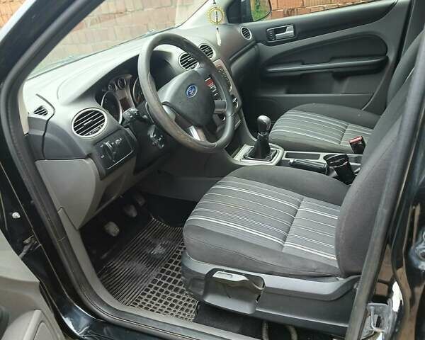 Черный Форд Фокус, объемом двигателя 1.56 л и пробегом 299 тыс. км за 6450 $, фото 3 на Automoto.ua