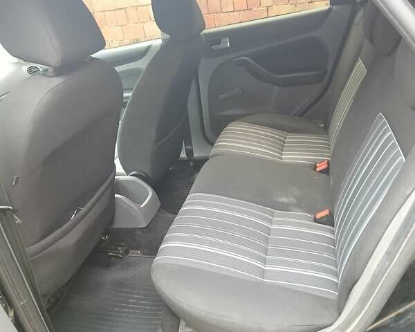 Черный Форд Фокус, объемом двигателя 1.56 л и пробегом 299 тыс. км за 6450 $, фото 4 на Automoto.ua