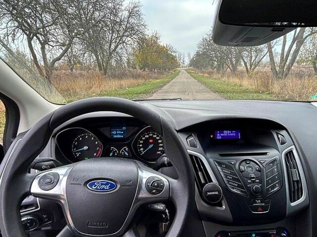 Черный Форд Фокус, объемом двигателя 1.6 л и пробегом 205 тыс. км за 8200 $, фото 1 на Automoto.ua