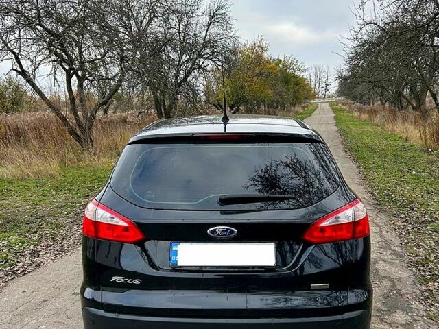Черный Форд Фокус, объемом двигателя 1.6 л и пробегом 205 тыс. км за 8200 $, фото 6 на Automoto.ua