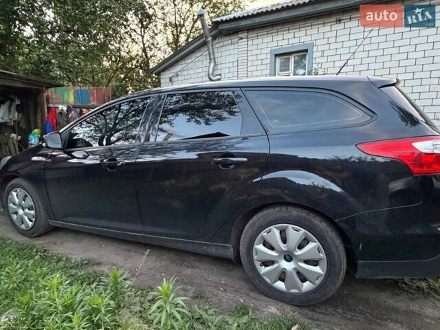 Чорний Форд Фокус, об'ємом двигуна 1.6 л та пробігом 209 тис. км за 7400 $, фото 2 на Automoto.ua