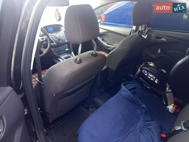 Черный Форд Фокус, объемом двигателя 1.6 л и пробегом 240 тыс. км за 7900 $, фото 14 на Automoto.ua