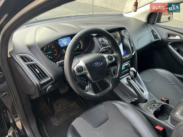 Черный Форд Фокус, объемом двигателя 2 л и пробегом 249 тыс. км за 7600 $, фото 16 на Automoto.ua