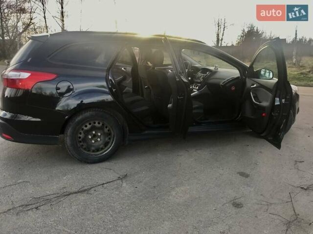 Чорний Форд Фокус, об'ємом двигуна 1.6 л та пробігом 282 тис. км за 6900 $, фото 13 на Automoto.ua