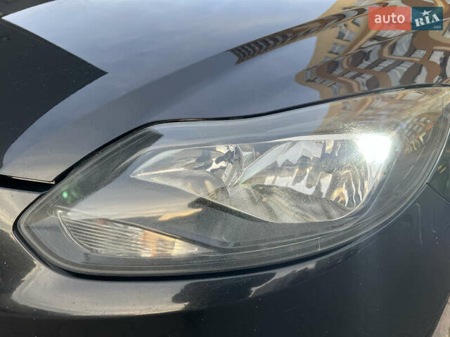 Черный Форд Фокус, объемом двигателя 2 л и пробегом 249 тыс. км за 7600 $, фото 12 на Automoto.ua