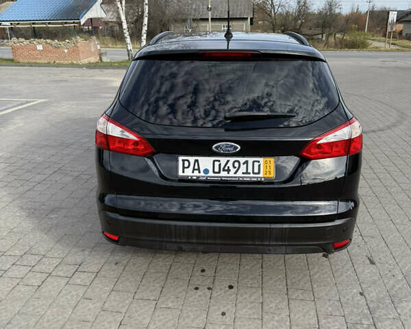 Черный Форд Фокус, объемом двигателя 1.6 л и пробегом 205 тыс. км за 7000 $, фото 6 на Automoto.ua