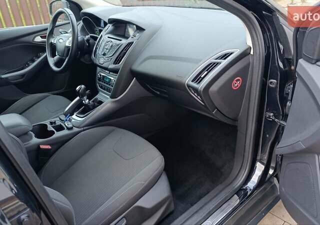 Чорний Форд Фокус, об'ємом двигуна 1.6 л та пробігом 232 тис. км за 8477 $, фото 49 на Automoto.ua