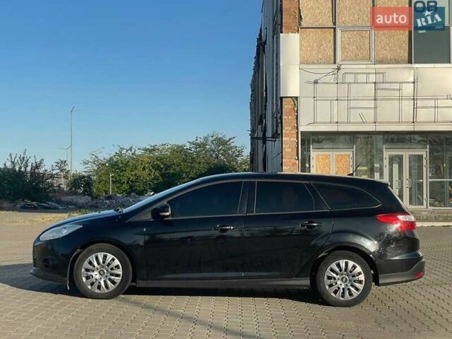 Черный Форд Фокус, объемом двигателя 1.6 л и пробегом 265 тыс. км за 6900 $, фото 6 на Automoto.ua